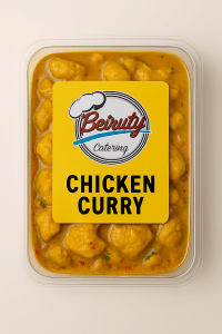“Lebanese chicken curry in Beiruty Catering packaging with golden sauce, tender chicken pieces, and aromatic spices.”