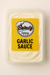 “Garlic sauce in Beiruty Catering packaging with smooth, creamy texture made from garlic, oil, and lemon.”